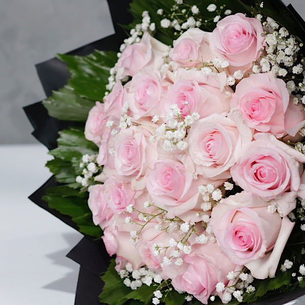 Pastel pink rose and baby's breath bouquet by Bella Rosa Gardens