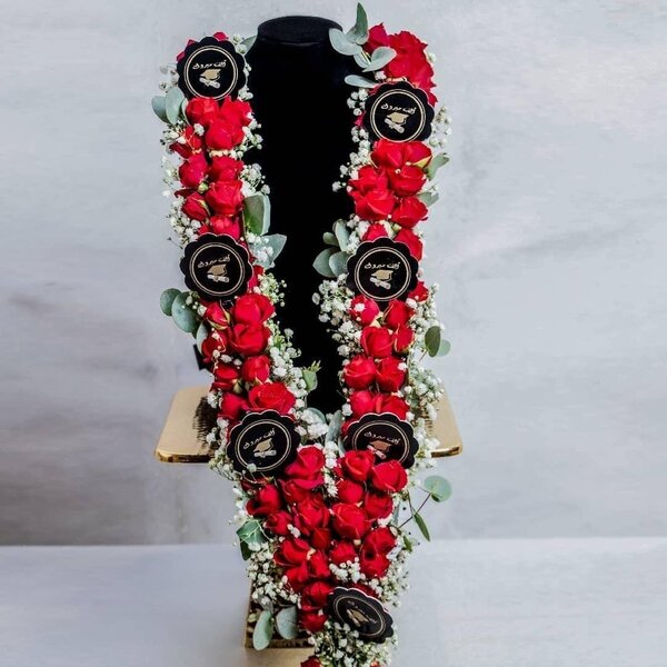Natural orchids Lei by One of a Kind Flowers and Gifts LLC